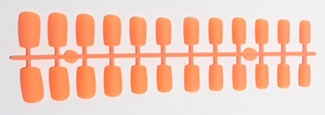 Detailed view of 24 pieces orange matte long coffin fake nail tips on a plastic runner frame