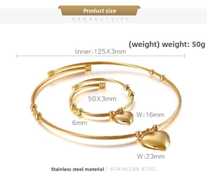 Detailed view of the gold steel cable jewelry set with dimensions for heart necklace and bracelet