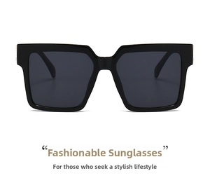 Front view of square frame sunglasses with thick black frames and dark lenses
