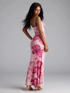 Detail of the pink floral maxi dress showing the backless design and slim fit cut