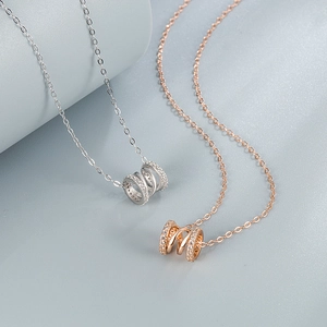 S925 sterling silver necklaces in silver and rose gold with pavé cylinder pendants