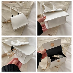 Detailansicht der weißen PU-Lederhandtasche mit Oberseite, Seite, Boden und Innenraum