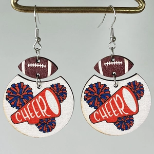 Macro detail of wooden football earrings featuring a red cheer megaphone and pom-poms