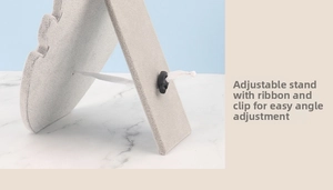 Adjustable back support of the velvet jewelry display rack using ribbon and buckle system