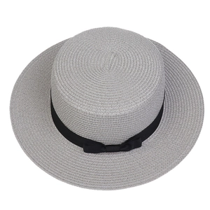 Detailed top view of grey woven boater hat featuring a stylish black ribbon bow decoration