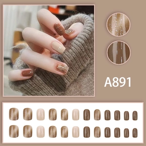 Short brown and beige glitter press-on nails with cat-eye effect and glossy finish
