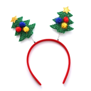 Christmas headband with spring-loaded glitter trees and colorful pom-poms on red band