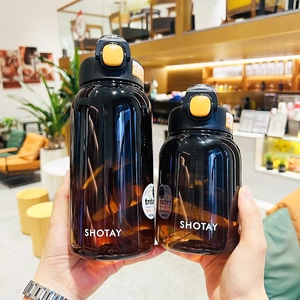 Detail of Tritan water bottles showing BPA Free labels and brown translucent finish