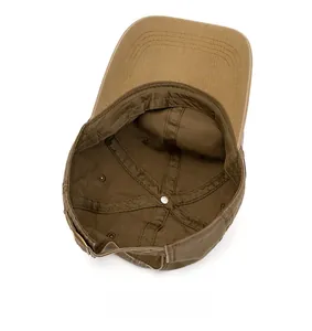 Detailed view of internal cotton seams and adjustable metal buckle on baseball cap