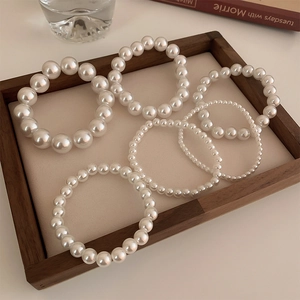 Set of 6 high-gloss white pearl elastic bracelets and hair ties in various sizes