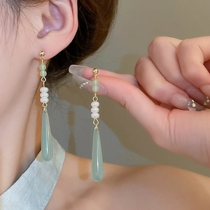 Elegant Chinese style long teardrop earrings with green resin and white pearls for women
