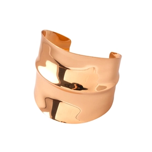 Irregular concave gold bangle with a polished metallic finish and wavy open design