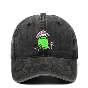 Washed black cotton baseball cap featuring embroidered frog wearing mushroom hat