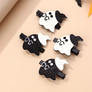 Detailed view of four ghost hair clips in black and white sequins for Halloween party hair accessories