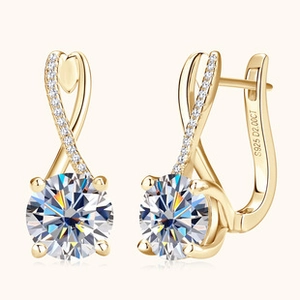 Macro shot of S925 hallmark and 2.00CT engraving on polished gold moissanite earrings