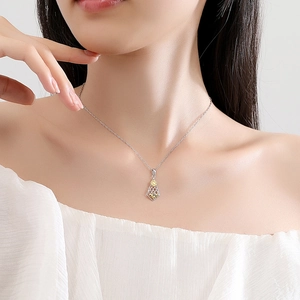 S925 silver sunflower and honeybee pendant necklace on model with golden accents