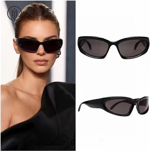 Fashionable black wrap-around sports sunglasses with sleek aerodynamic shield frame