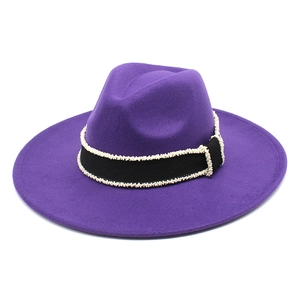 Detail of purple wide brim wool felt jazz hat with black grosgrain beaded band