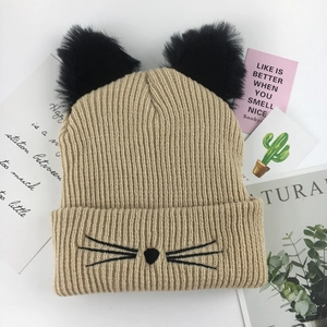 Cute khaki knit cat ear beanie with embroidered whiskers and soft pompom details