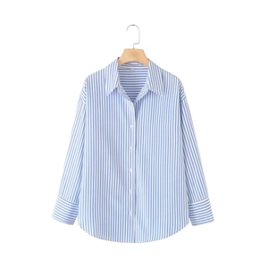 Detail view of blue and white striped poplin shirt with lapel collar and buttons