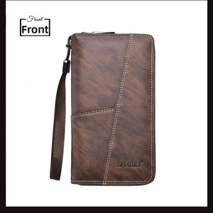 Front view of brown leather long wallet featuring zipper closure and wrist strap