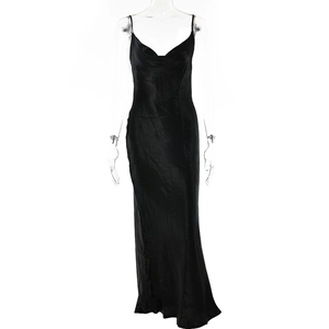 Close-up of elegant black backless satin maxi dress with cowl neck on a mannequin