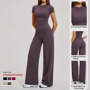Women's dark purple yoga set with slim short sleeve top and high-waisted wide-leg pants