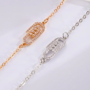 Elegant gold and silver paperclip link bracelets with micro-set cubic zirconia accents