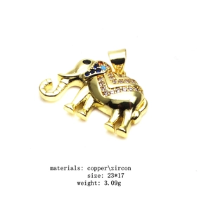 Detail of golden copper elephant pendant with colorful zircon settings and dimensions