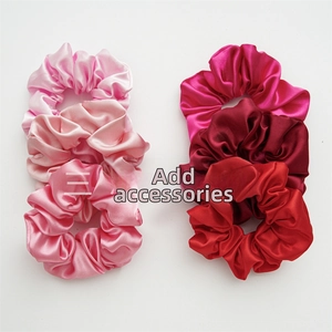 Detailed set of six satin silk hair scrunchies in gradient pink and red shades