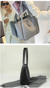 Macro detail of high-capacity tote bag in matte leather with metallic zipper accents