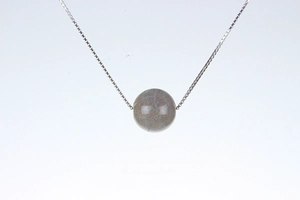 Detailed close-up of a S925 silver necklace featuring a spherical labradorite pendant