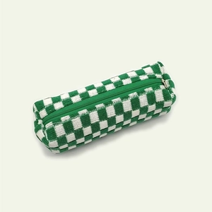 Detailed view of green and white checkered knit stationery bag with smooth zipper closure