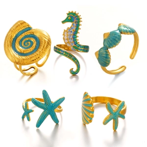 Adjustable ocean theme gold rings set featuring starfish shell and seahorse designs