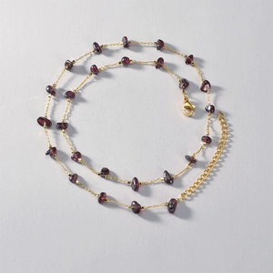 French vintage bohemian necklace with garnet stones and golden lobster clasp closure