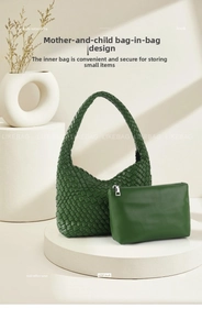 Detail of dark green woven hobo bag with a matching removable leather inner pouch