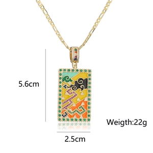Detail view of 18K gold plated necklace showing pendant dimensions 5.6cm by 2.5cm