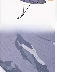 Detail of outdoor camo sun hat with 26cm reinforced wind rope and precision stitching