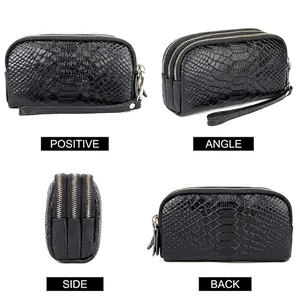 Black snake pattern leather clutch bag with triple zippers and wristlet strap
