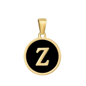 Detailed macro of a gold and black round pendant featuring a bold letter Z design