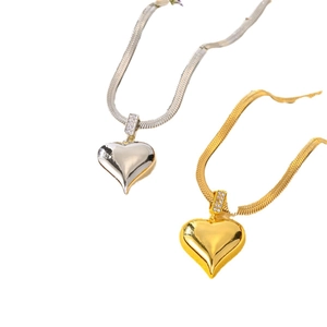 Sleek heart pendant necklaces with crystals on flat snake chains in gold and silver