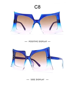 Front and side views of oversized square gradient sunglasses in blue and transparent