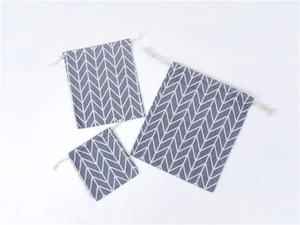 Three sizes of cotton linen drawstring bags with grey and white chevron arrow patterns