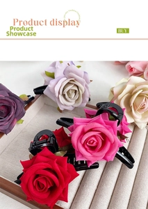 Detailed view of artificial rose hair claws in red, pink, purple, and cream fabrics