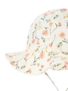 Close-up of floral print cotton baby sun hat with drawstring in ivory and orange