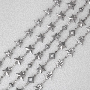 Stainless steel chain with hollow star heart and diamond shapes on white leather