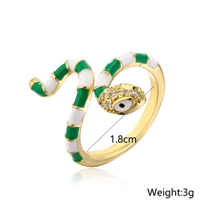 Detailed view of snake ring with green enamel, 1.8cm diameter and 3g weight specifications