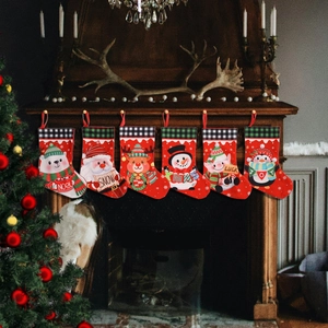 Set of 6 plaid Christmas stockings with cartoon characters hanging by a fireplace