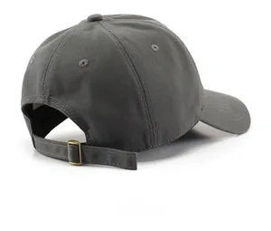 Detail of dark grey cotton baseball cap showing adjustable metal buckle and stitching