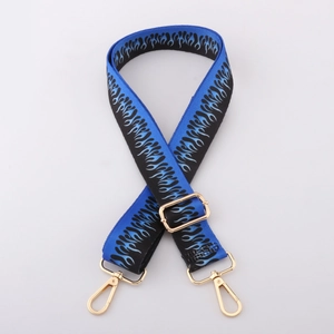 Adjustable nylon bag strap with blue flame pattern and gold metal lobster clasps